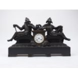 A French bronze mantel clock, late 19th century, the white enamel dial flanked by two reclining