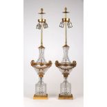A pair of ormolu mounted cut baluster table lamps, purchased from Harrods as Baccarat, diamond