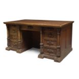 A Victorian oak kneehole desk, c.1860, believed to have originally been used in Dumfries House,