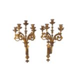 A pair of gilt-bronze five-light wall appliques, first half 20th century, each with scrolling