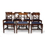 A set of seven Regency style mahogany dining chairs, 20th Century, comprising one a carver chair and
