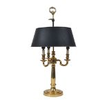 A modern brass three-light bouillotte lamp, the tapering shaft supporting scroll branches, 39cm high