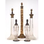 A pair of glass column table lamps, late 20th century, each with gilt-metal capital and tapering