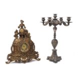 A French gilt bronze mantel clock surmounted by a lady, 20th century, the circular dial with Roman