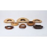 A group of mixed African ivory bangles, 19th century, of varying patinas an sizes, of round and