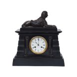 A French bronze and marble mantel clock, early 20th century, in the Egyptian revival manner, the