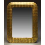 A contemporary two tone gilt mirror, of rounded rectangular form, 102cm high, 77cm widePlease