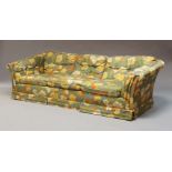 A floral upholstered sofa suite retailed by Maples, c.1970, comprising a three seat sofa, 66cm high,