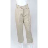 Joie: a pair of Augustin beige linen trousers, size '4', together with a pair of Vivetta red and