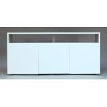 Habitat, a 'Kubrik' white lacquered sideboard, of recent manufacture, with open shelf above three