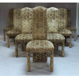 A large circular dining table and ten chairs, late 20th century, the table with tooled leather lined