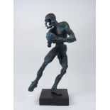 Kurt Lossgott, South African, a resin sculpture of a rugby player, 1988, signed K Lossgott 1988,