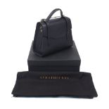 Strathberry: a Midi Tote black leather handbag with bar closure, strap and handle, 29cm x 27.5cm x
