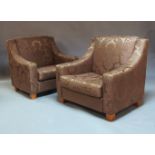 A pair of contemporary floral upholstered mauve single seat armchairs on square tapering feet, 106cm