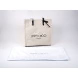 Jimmy Choo: a canvas 'logo' tote bag in natural colour way with black lettering and black handles,