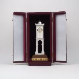 A silver table clock tower, by Grant MacDonald Silversmiths, London 2019, modelled after the Old