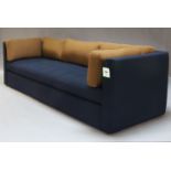 Hay, a contemporary 'Hackney' three-seater sofa, upholstered in navy blue woollen fabric, with loose