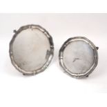 Two silver waiters, both of shaped circular form, the larger example, London, 1915, Reid & Sons,