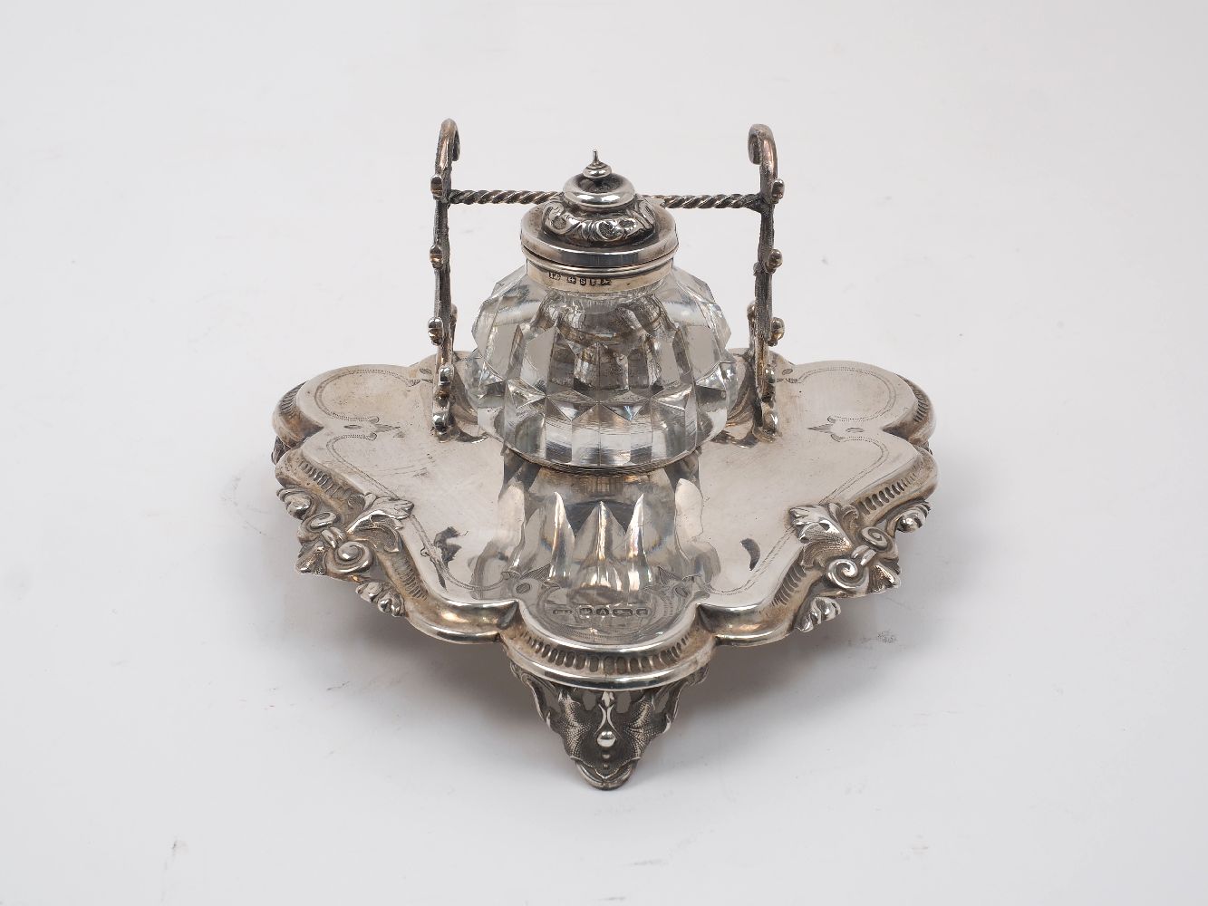 A Victorian silver inkstand, Sheffield, 1868, John Harrison with an associated cut glass inkwell,