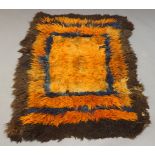 A sheepskin indigo and madder dyed rug, Kirghiz, Pamar Mountains, 168cm x 120cm Provenance: Acquired