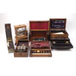A collection of scientific equipment, 20th century, to include a mahogany cased dip circle, plaque