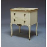 A French white painted bedside table, the faux marble painted top above two drawers raised on