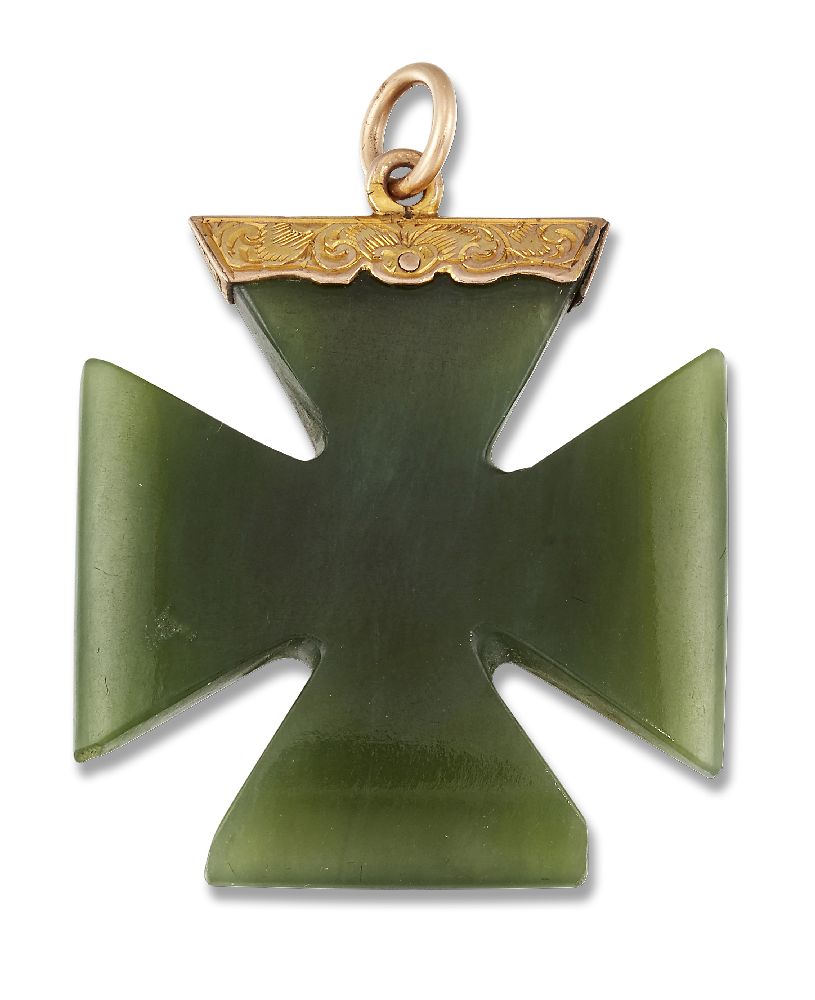 A Victorian gold mounted nephrite jade cross pendant, the Maltese cross shaped pendant to a gold