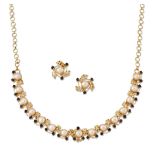 A cultured pearl and onyx necklace and earrings, the necklace with front section set with a line