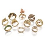 A collection of ten gem-set rings: comprising one of foliate design set with coral leaves and