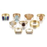 A group of nine various gem rings, including: an 18ct gold baguette diamond and diamond; an oval