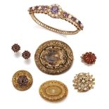 A group of jewellery, comprising; A late Victorian smokey quartz plaid brooch with thistle