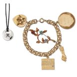 A group of jewellery, comprising: a fancy curb-link charm bracelet, suspending four charms, one a