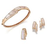 A suite of mother-of-pearl and diamond jewellery, comprising; a bangle of hinged graduated design,