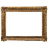 A Gilded Composition Régence Style Frame, mid-late 20th century, with schematic leaf ogee sight,