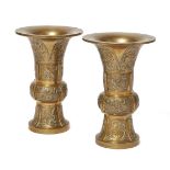 A pair of French bronze Japonisme vases, by Maison Marnyhac, Paris, late 19th century, each in the