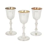 Three Irish silver wine goblets, Dublin, 1974, Royal Irish Silver Co., the plain cups designed