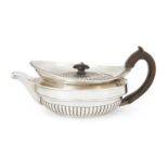 A George III silver teapot, London, 1810, probably J W Story & W Elliott, of flattened oval form