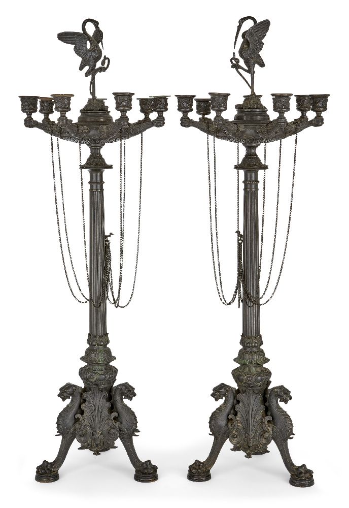 A pair of large French bronze seven-light candelabra, in the manner of Barbedienne, late 19th