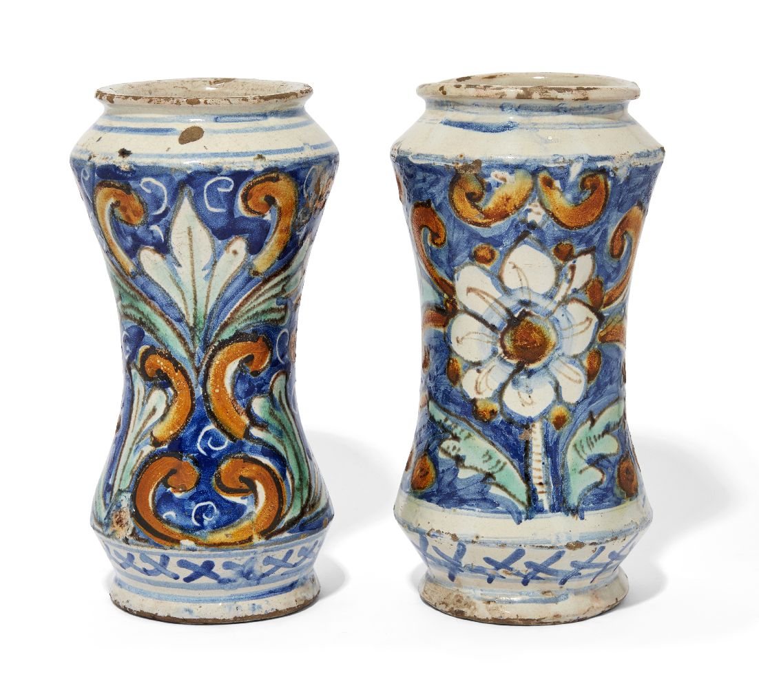 Two Sicilian maiolica albarelli, late 17th century, Caltagirone, each of waisted form, one painted