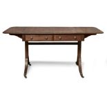 A Regency mahogany sofa table, the rounded rectangular top above two frieze drawers raised on