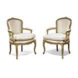 A pair of 19th century fauteuils, cream upholstered backs and seats, raised on cabriole legs (2)