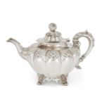 A Victorian silver teapot, London, 1860, A. B. Savory & Sons (William Smily), of rounded form, the