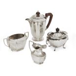 A mixed group of silver tea wares comprising: a Mappin & Webb silver coffee pot, Sheffield, 1957,