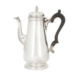 A George V silver coffee pot, London, 1915, D. & J. Wellby, with tapering cylindrical body and