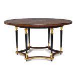 A continental style mahogany and ebonised centre table, late 20th century, the circular top