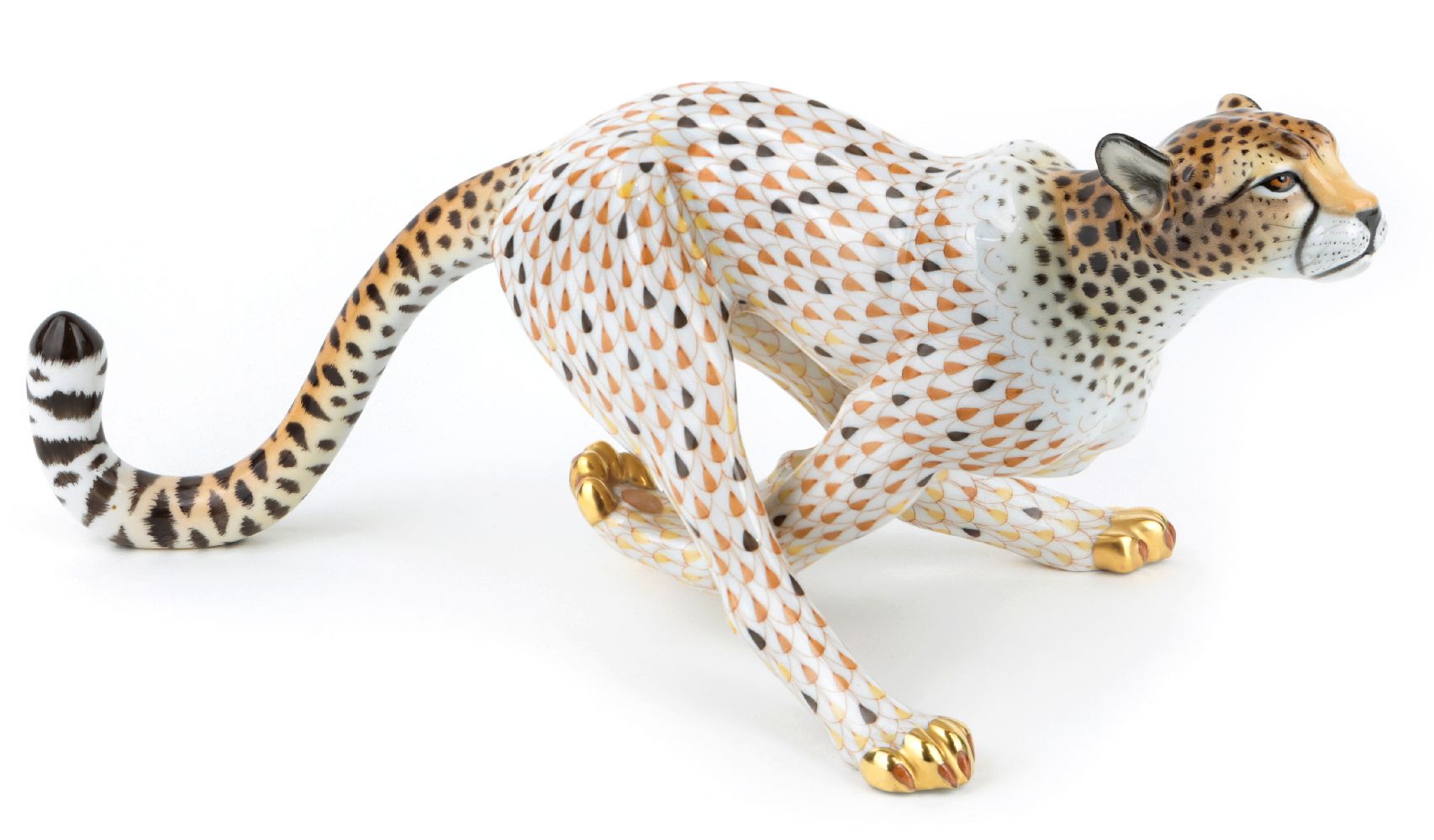 A Herend porcelain model of a running cheetah, late 20th/early 21st century, decorated in the fish