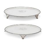 A pair of George III silver salvers, London, 1784, John Lambe, designed with beaded borders and