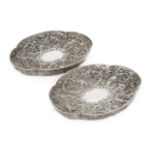 A pair of Victorian silver quatrefoil dishes, London, c.1891, Wakely & Wheeler, repousse decorated