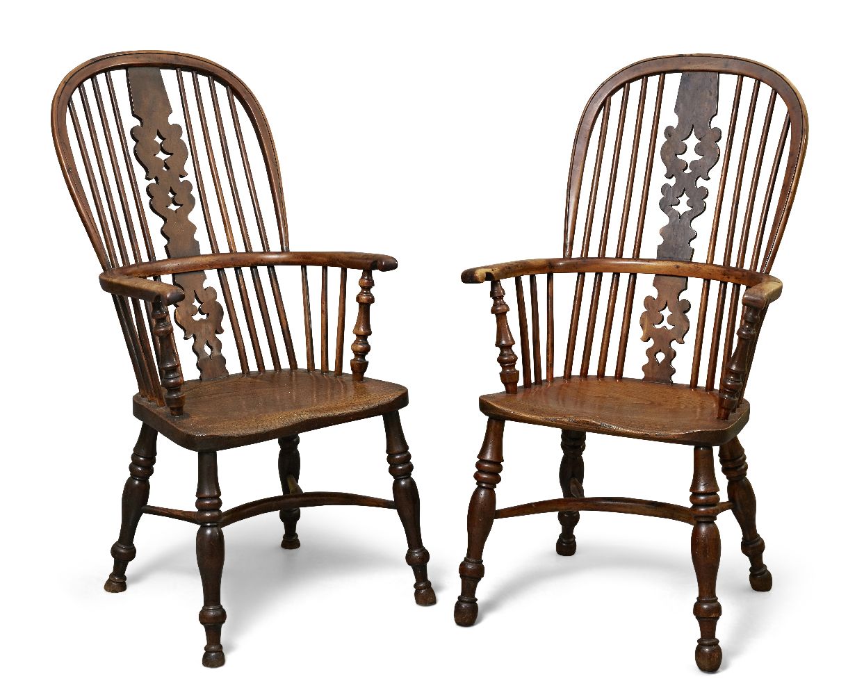 A pair of Victorian yew wood and elm Windsor armchairs, the high arching backs with turned