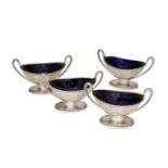 A set of four William IV silver salts, London, 1835, maker JA, of oval form with reeded twin